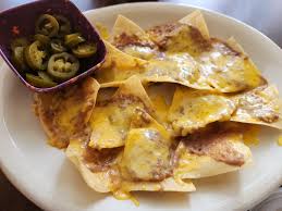 The Original Mexican Eats Café signature dishes The Original Nachos
Pork Tamale
Beef and Chicken Combo